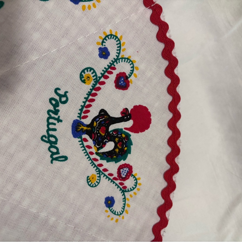Portugal roll warmer. Colorful Embroidered Fabric with Red Accents - Picture 3 of 9